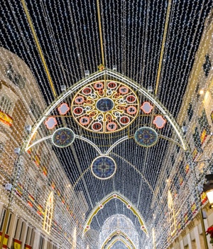 Christmas decorations cover a pedestrian street 